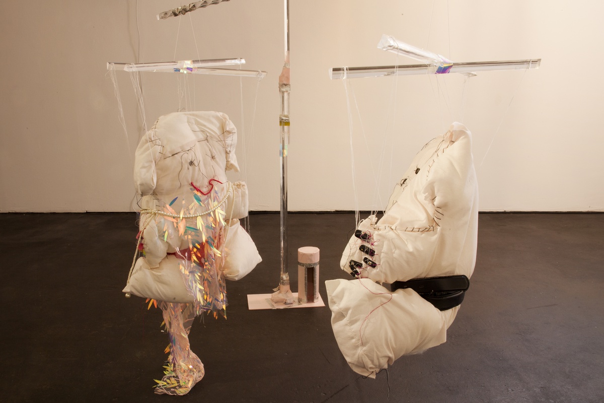 Cytter/Roebas, Dance of the Gods, 2019pillows, pearls, fabric, acrylic nails, leather belt, metal chains, veil, thread, hardware, buttons, plexiglass, tape, fishing line, speaker &amp; disco ball motordimensions variable